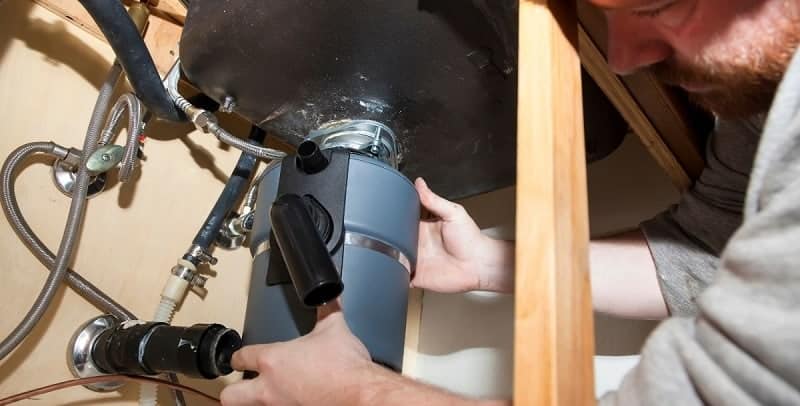 how to remove a garbage disposal from sink
